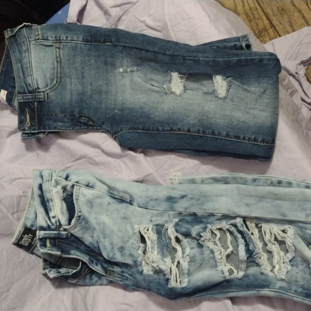 2 pairs of jeans size 00 never worn